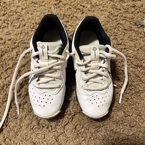 White and Black Nike cleats